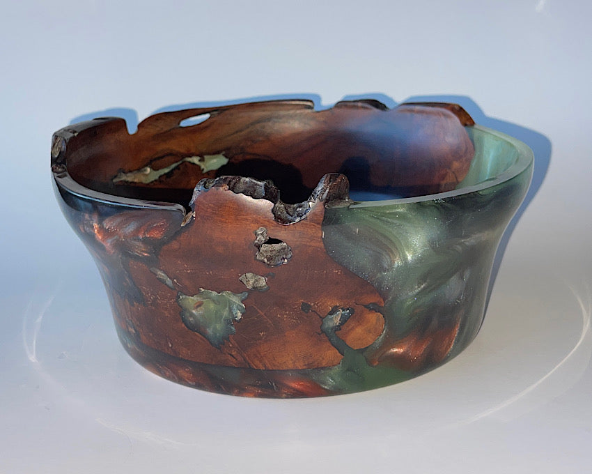Bowl made of Manzanita wood and green epoxy with natural edges