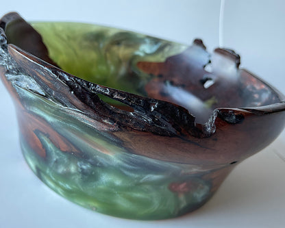 Bowl made of Manzanita wood and green epoxy with natural edges